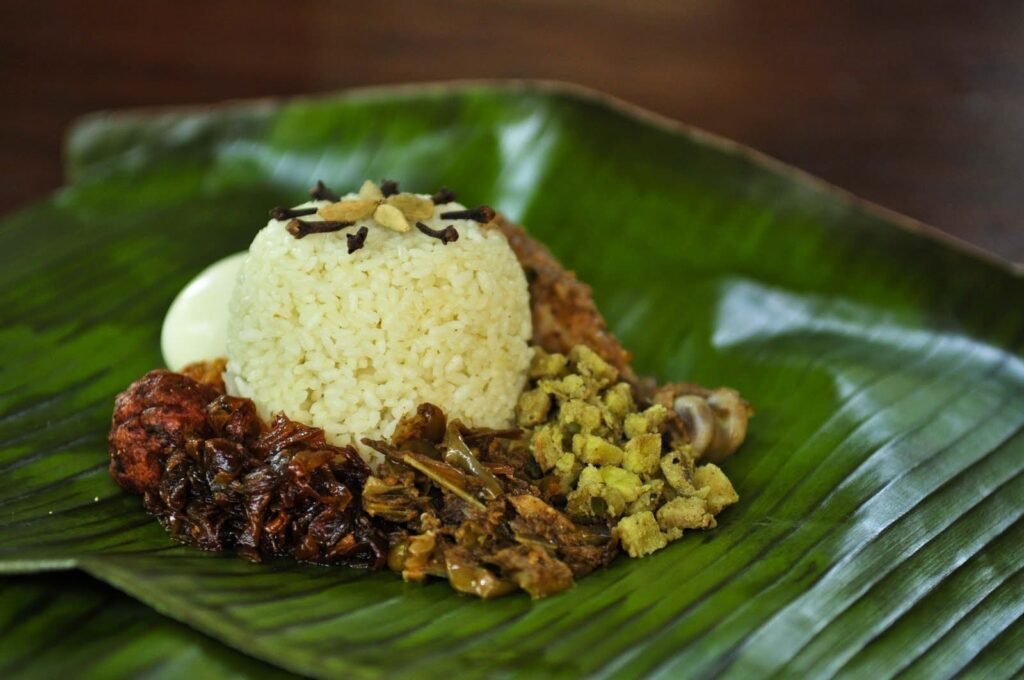 Traditional Sri Lankan rice and curry served on a banana leaf