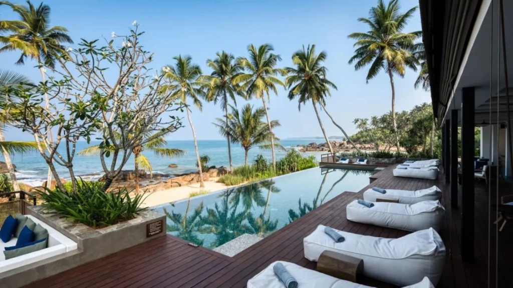 Luxury beachfront resort with infinity pool overlooking the Indian Ocean on Sri Lanka's south coast.