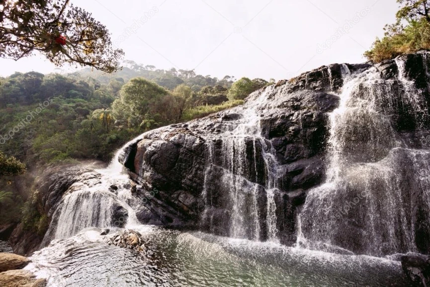 Baker's Falls waterfall in Horton Plains National Park, one of Sri Lanka's most beautiful hiking destinations.