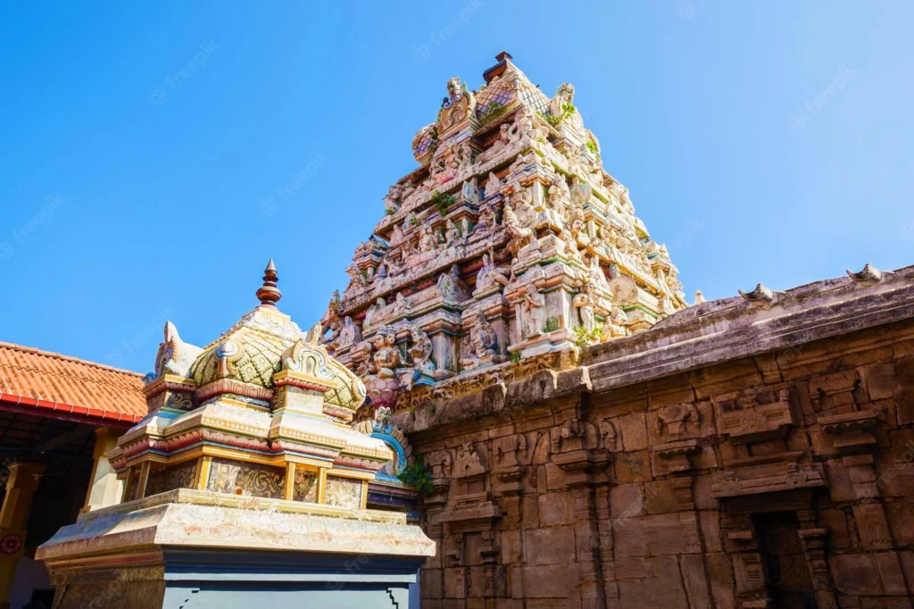 Historic Hindu temple with colourful sculpted gopuram and traditional stone architecture at Munneswaram near Chilaw, Sri Lanka.
